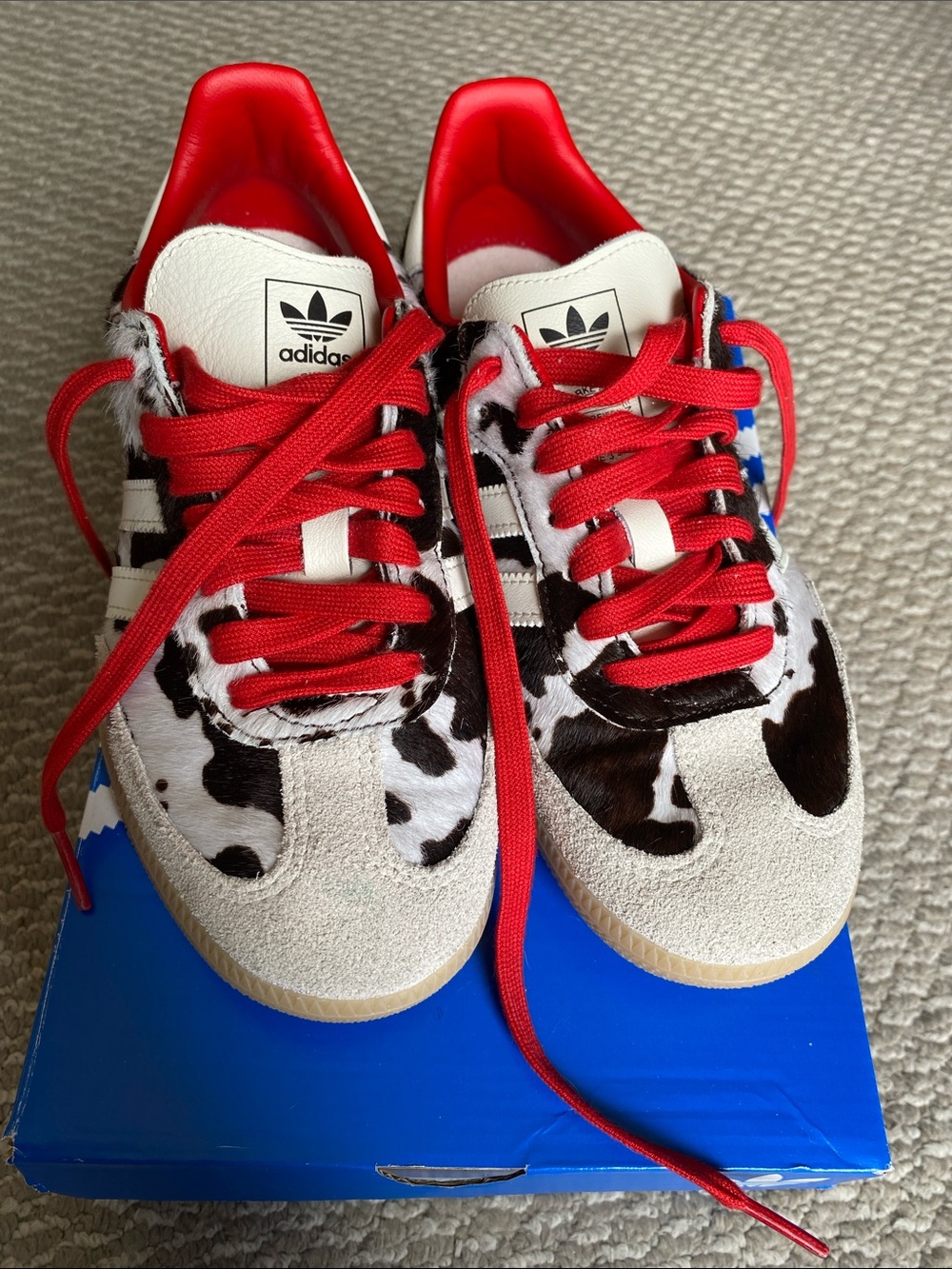 Adidas Cow-Print Sneakers with Red Accents